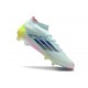 Bota adidas F50 Elite Mid FG Casi Azul Azul Semilúcido Semi Amarillo Solar